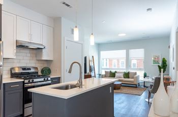 Quartz kitchen countertops & tile backsplash